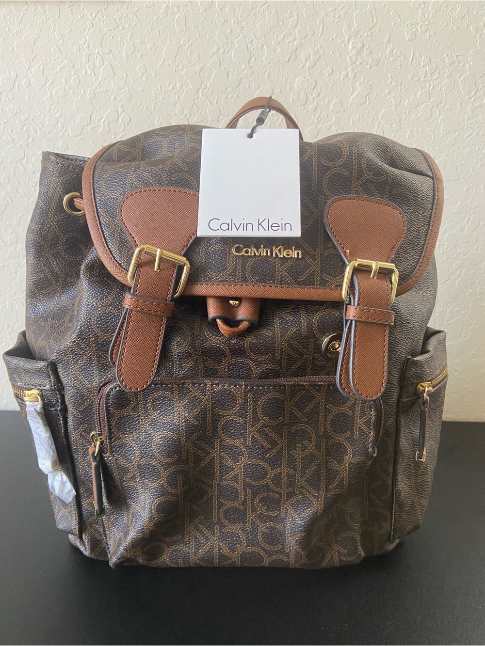NWT
Calvin Klein Signature Monogram
Backpack Brown Luggage Tan
